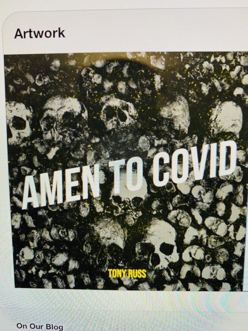 A black and white photo of skulls with the words amen to covid
