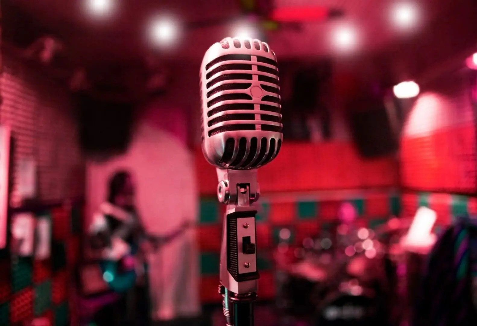 A microphone is in front of a band.