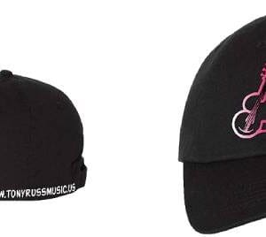 Two different views of a black hat with pink lettering.