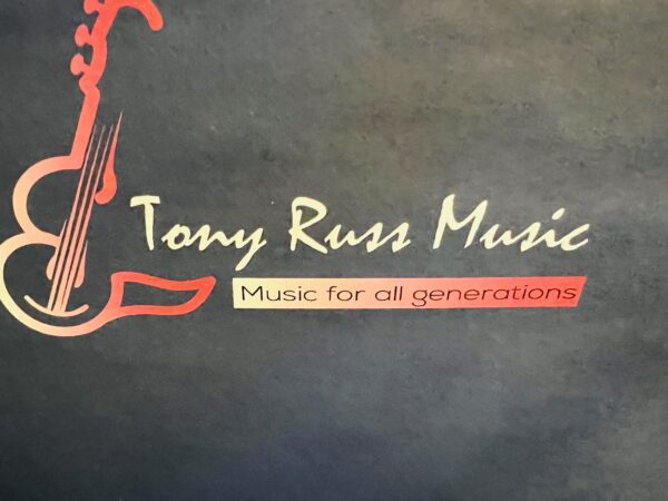 A black and red logo for tony russ music.
